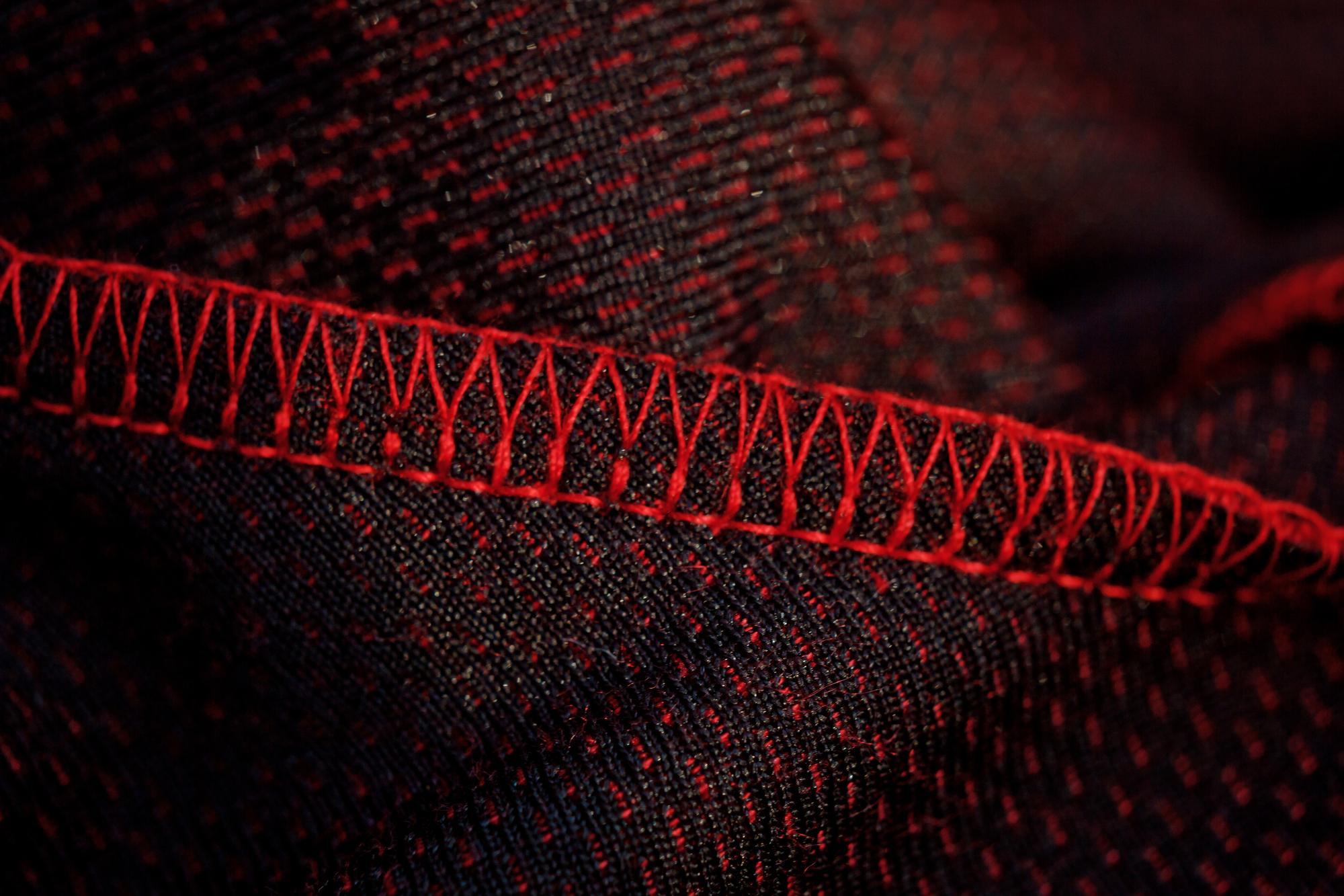 Close-up of high-tech embroidery on dark fabric